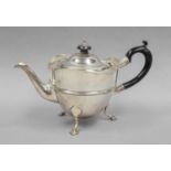 An Edward VII Silver Teapot, by Charles Stuart Harris, London, 1906, tapering cylindrical and on