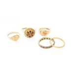 Five Rings, including a 22 carat gold band ring, finger size M1/2; a 9 carat gold signet ring,