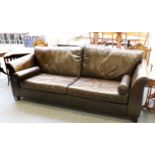 A Brown Halo Three Seater Leather Sofa, designed by Timothy Oulton