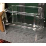 A Modern Graduated Pair of Perspex Coffee Tables, largest 120cm by 80cm