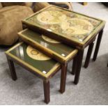 A Nest of Brass Mounted Tables, each with decorative maps under a glazed top