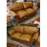 A Pair of Leather Sofas (one of which is a sofa bed)Condition is generally very good. Some minor