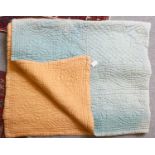 Early 20th Century Pale Blue and Peach Reversible Quilt, hand quilted with central flower within a