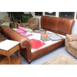 A Reproduction Brown Leather Bedstead, with side rails and a divan base, 210cm wide