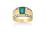 An 18 Carat Gold Emerald and Diamond Ringthe emerald-cut emerald in a yellow claw setting, to a