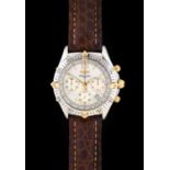 Breitling: A Steel and Gold Calendar Chronograph Wristwatch, signed Breitling, model: Chrono