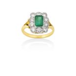 An Emerald and Diamond Cluster Ringthe emerald-cut emerald within a border of round brilliant cut