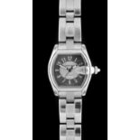 Cartier: A Stainless Steel Automatic Calendar Centre Seconds Wristwatch, signed Cartier, model: