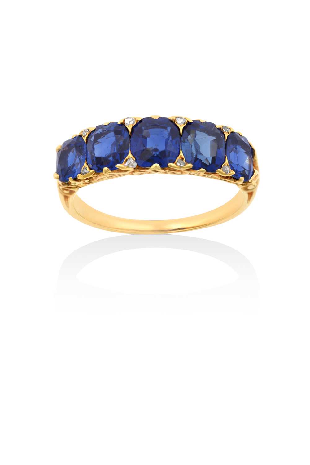 A Late Victorian Sapphire Five Stone Ringthe graduated oval cut sapphires with rose cut diamond