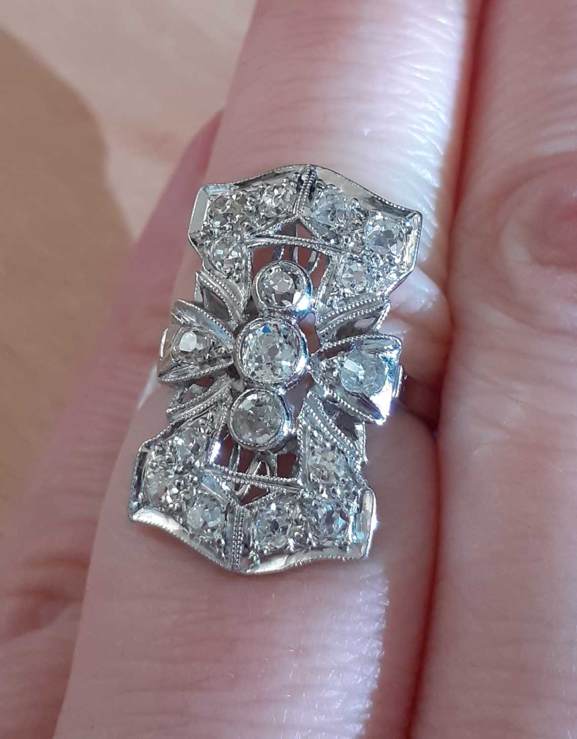 An Art Deco Style Diamond Cluster Ring three graduated old cut diamonds aligned up the finger, - Image 3 of 3