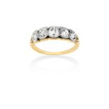 A Diamond Five Stone Ringthe graduated old cut diamonds in white rubbed over settings, to a yellow