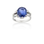 A Sapphire and Diamond Ringthe cushion shaped sapphire to trefoil motif shoulders composed of two