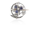 An Early 20th Century Sapphire and Diamond Broochthe central floral cluster comprising of a raised