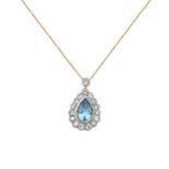 An Aquamarine and Diamond Cluster Pendant on Chainthe pear cut aquamarine within a border of round