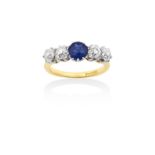 A Sapphire and Diamond Five Stone Ringthe round cut sapphire flanked by pairs of old cut diamonds,