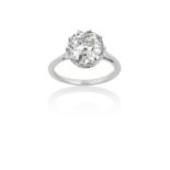 A Diamond Solitaire Ringthe old cut diamond in a white claw setting, to a tapered shoulder plain