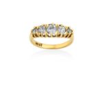 A Diamond Five Stone Ringthe graduated old cut diamonds in yellow claw settings, to a plain polished