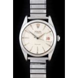 Rolex: A Stainless Steel Centre Seconds "Roulette" Calendar Wristwatch, signed Rolex, model: