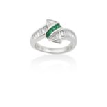 An Emerald and Diamond Ringa row of calibré cut emeralds flanked by trilliant cut diamonds, to