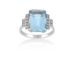 An Aquamarine and Diamond Ringthe emerald-cut aquamarine in a white four claw setting, to round