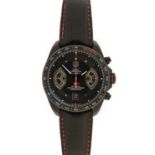 Tag Heuer: A Titanium Black PVD Coated Automatic Calendar Chronograph Wristwatch, signed Tag