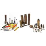 A Quantity of Militaria, including various modern inert flare rockets, a mortar shell, five brass