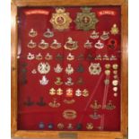 The King's Regiment (Liverpool) - a Collection of Helmet Plates and Badges, including a Victorian