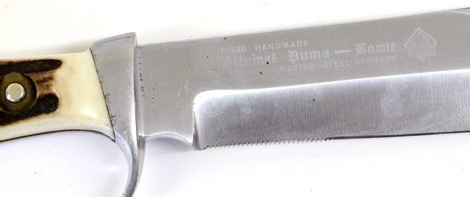 A German Puma Bowie Knife, the 16.5cm clip point steel blade with a 3cm serrated section, etched - Image 2 of 2