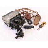 A Quantity of Militaria, comprising a post-Second World War prismatic pocket compass in stitched