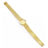 A lady's 9 carat gold Bueche Girod wristwatchTotal Weight: 21.5 grams, the bracelet clasp has a 9k