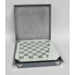 A Swarovski Silver Crystal Chess SetGood condition. One additional white pawn, one black lacking.