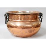 A Large Copper Planter, 19th century, with wroght iron handles, 46cm wideNo drainage holes. Some