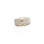A 9 Carat White Gold Diamond Half Hoop Ring, finger size R1/2Gross weight 4.7 grams.