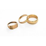 Two 9 Carat Gold Band Rings, finger sizes T and T1/2; and A 9 Carat Gold Signet Ring, finger size
