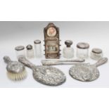 A Collection of Silver Mounted Dressing Table Items, including: mirrors, hairbrush, dressing table