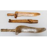 Three Late 19th Century Knitting Sticks, comprising an oak gull wing stick with turned handle,