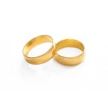 Two 22 Carat Gold Band Rings, finger sizes J and M1/2Gross weight 9.0 grams.