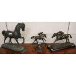 Four Reproduction Bronzed Resin Horse Figures