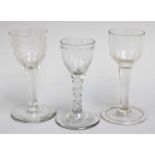 Three 18th Century Wine Glasses, two with faceted stems and etched bowls, another with plain stem