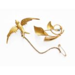 A Swallow Brooch, stamped '15CT', length 4.9cm; and Another Brooch, with applied plaque stamped '
