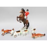Beswick Hunting Group, comprising: Huntsman on Rearing Horse, model No. 868, four fox hounds, a fox,