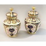 A Pair of Royal Crown Derby Porcelain Vases and Covers, in Imari pattern 1128, 14cm (2)Both knops