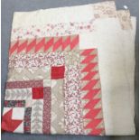 19th Century Patchwork Quilt, comprising a red patchwork star to the centre, framed by bands of