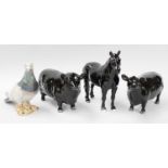 Beswick Aberdeen Angus Bull and Cow, model No. 1562 and 1563, black gloss; together with a black