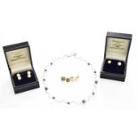 An 18 Carat White Gold Cultured Pearl Necklace, length 43.5cm; together with Four Pairs of