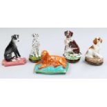Halcyon Days Enamels, three snuff boxes each surmounted by a seated hound, English Pointer, Beagle