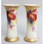 A Pair of Royal Worcester Trumpet-Shaped Vases by Kitty Blake, decorated with leaves and
