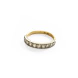A Diamond Half Hoop Ring, stamped '18CT&PT', finger size MThe ring is in good condition with