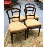 A Set of Four 19th Century Carved Mahogany Dining Chairs