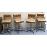 A Set of Four Leather Bar Stools with Button Backs and Seats with Chrome Supporting Bases